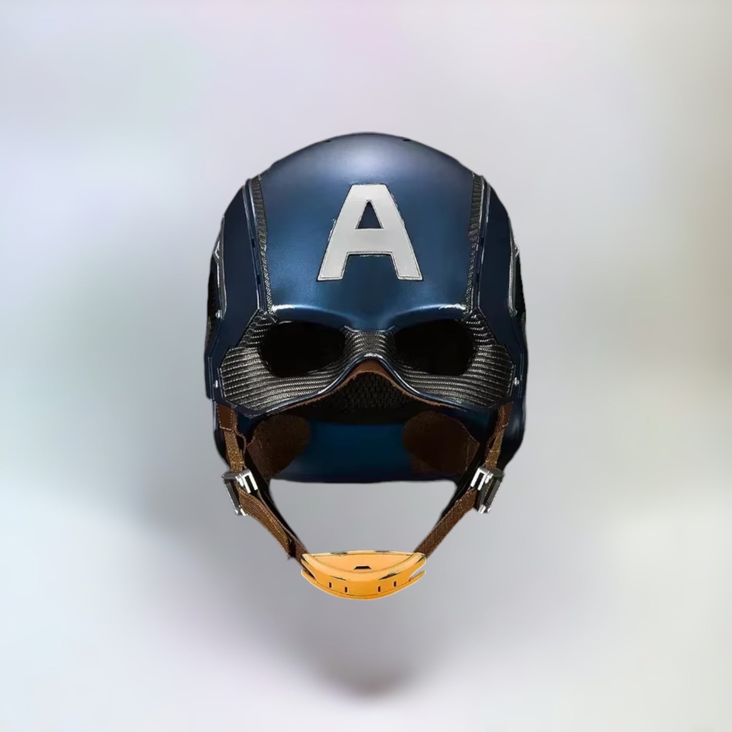 A very realistic battle damaged Captain America helmet, front side view with plain white background.