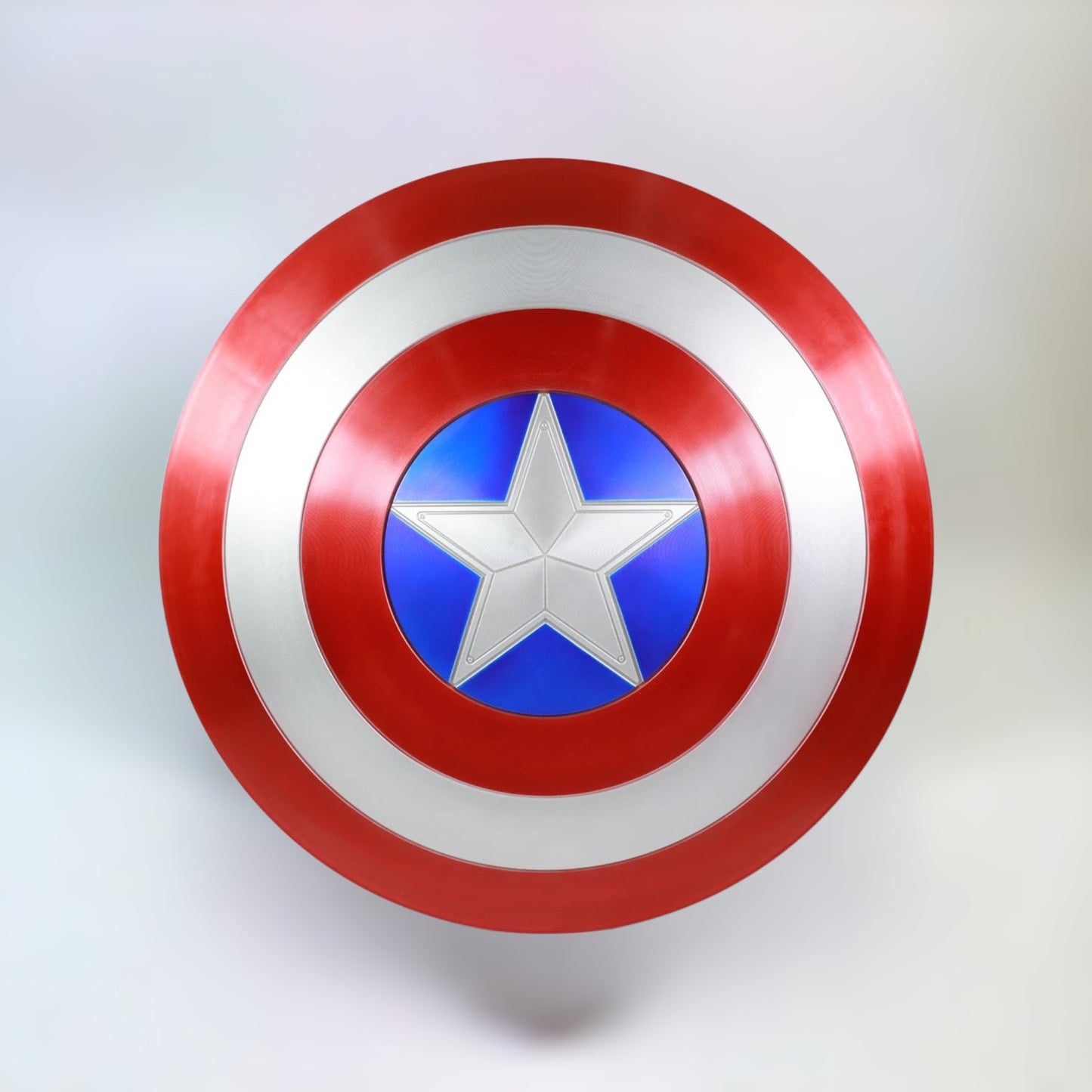 Front view of Captain America's iconic shield made from high-quality plastic on a plain white background.