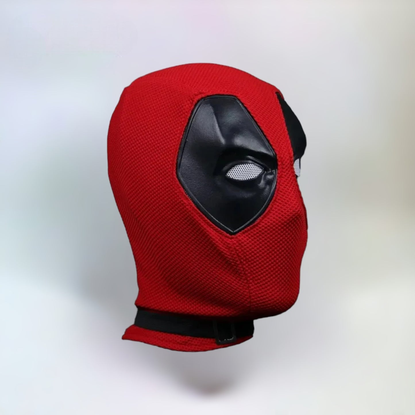 Deadpool mask fabric and leather eyes, deadpool and wolverine, deadpool mask side view with plain white background.