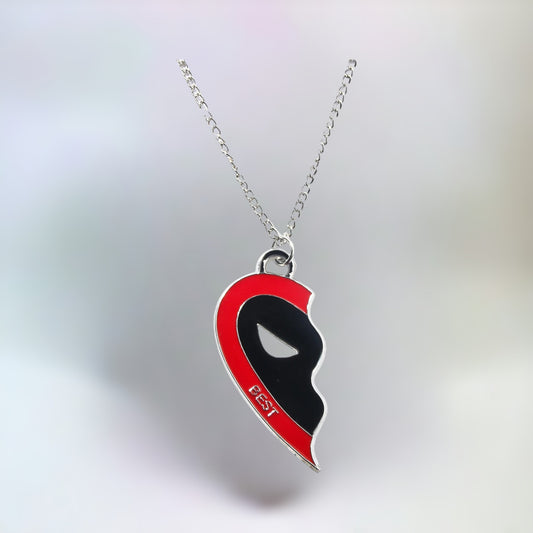 Close-up of the Deadpool pendant from the Deadpool and Wolverine best friends necklace on a plain white background.