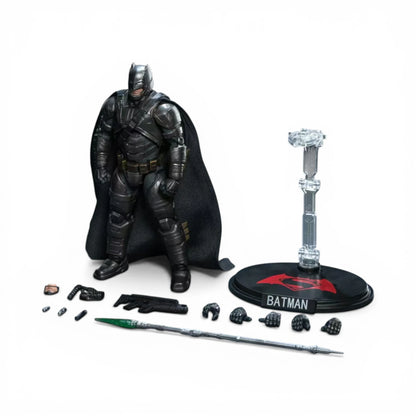 Batman action figure with accessories on a white background