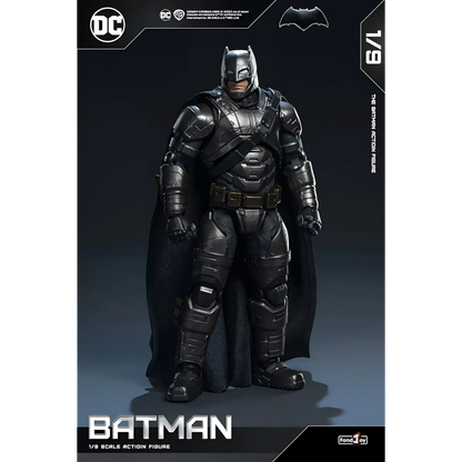 Batman action figure with detailed armor on a dark background, featuring DC logos.