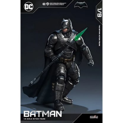 Batman action figure with a green spear on a dark background