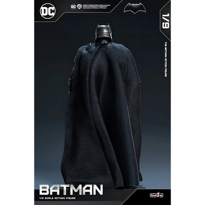 Batman action figure on a dark background with DC Comics branding