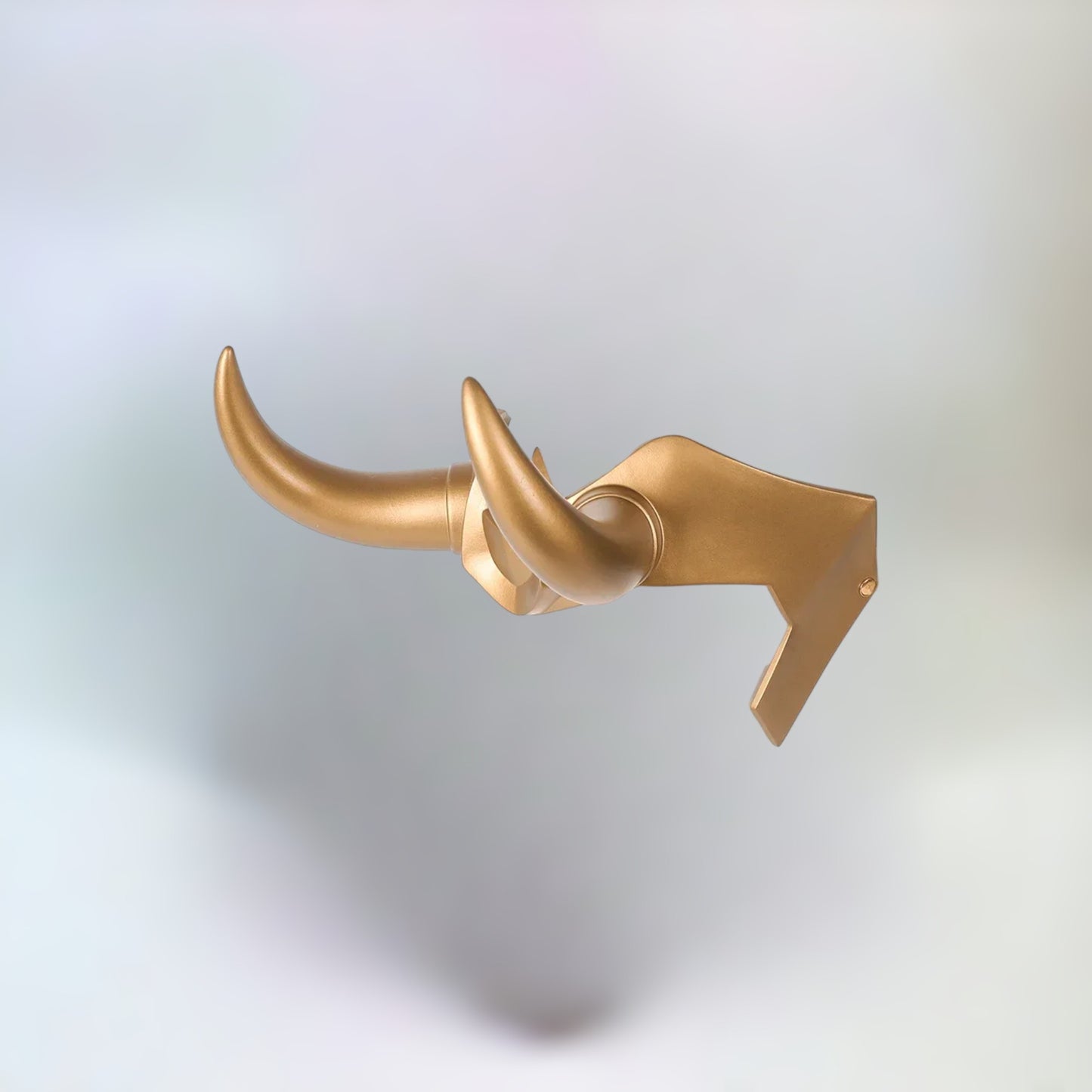 Side view of a realistic gold loki crown with the 2 iconic horns on a plain white background.