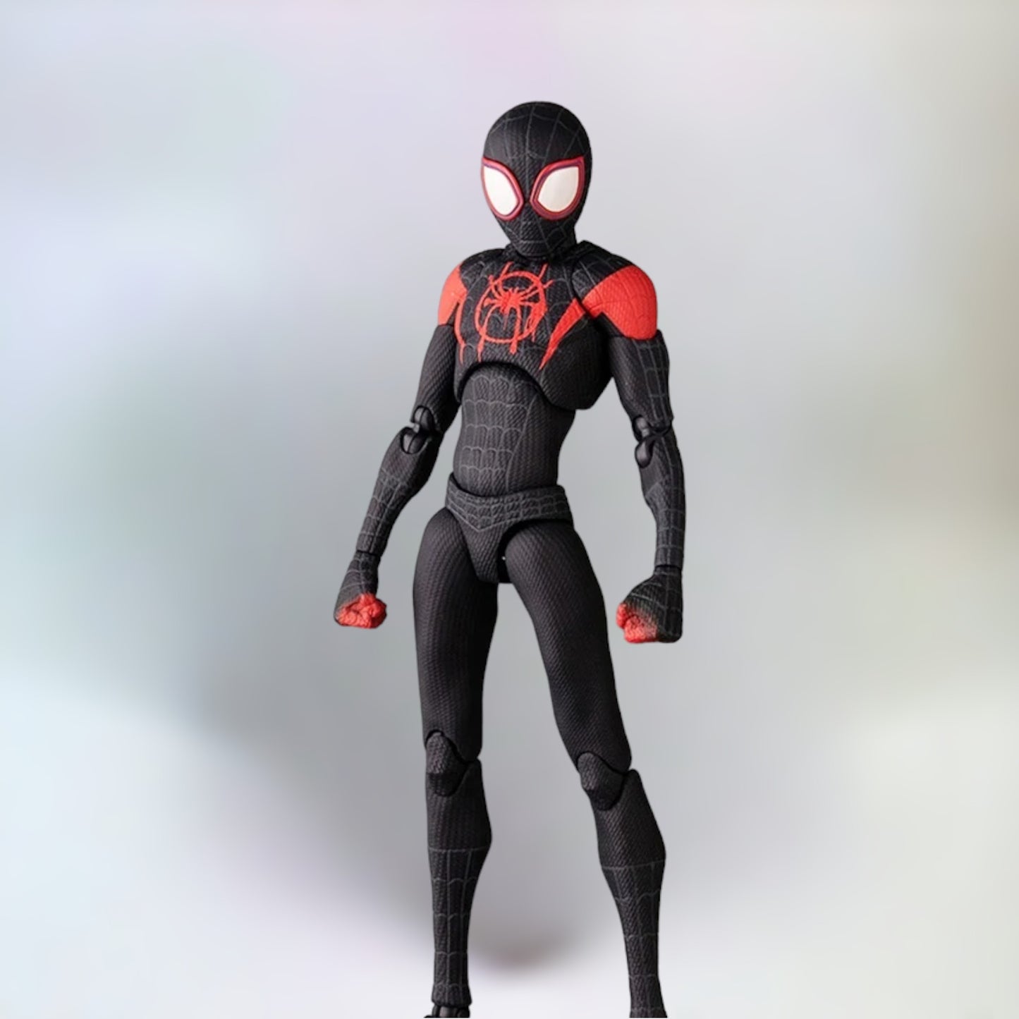 Miles Morales action figure standing with a plain white background.