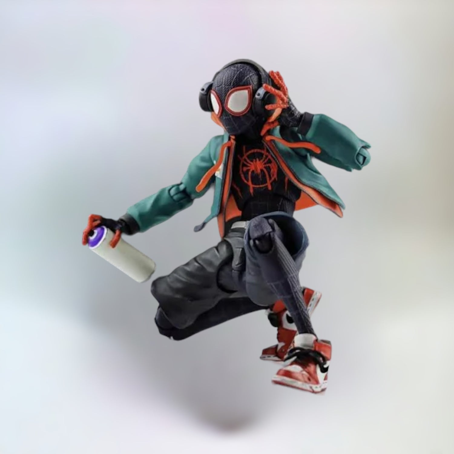 Miles Morales action figure in a cool pose with a plain white background.