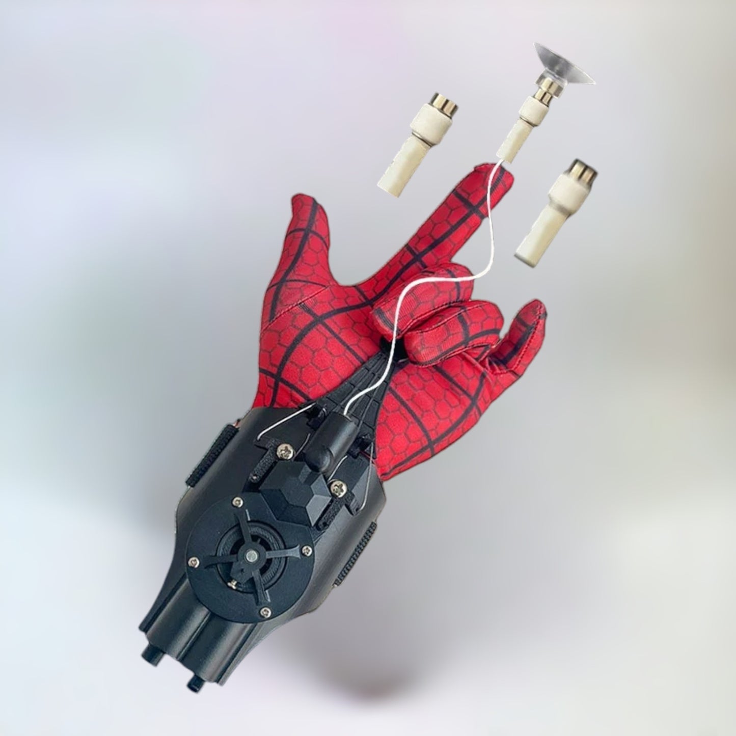 Spider-Man web shooter in black with an included red Spider-Man glove displayed on a plain white background.