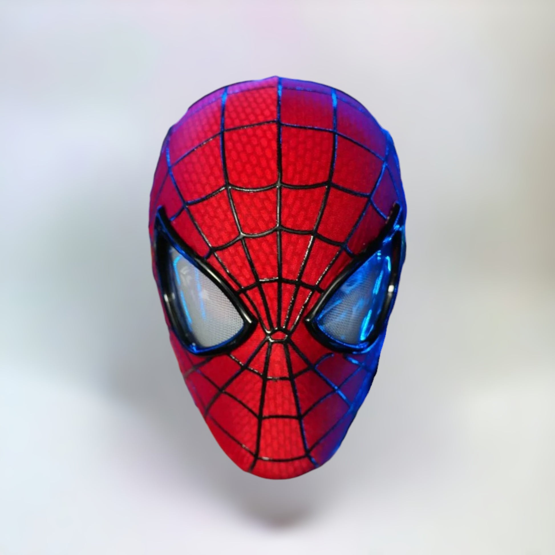 The Amazing Spiderman Mask with Blinking Movable Eyes Remote Controlled and LED Lights Eyes Open Spiderman mask with plain white background